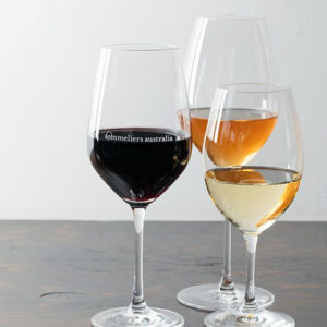 three glasses of varied wine